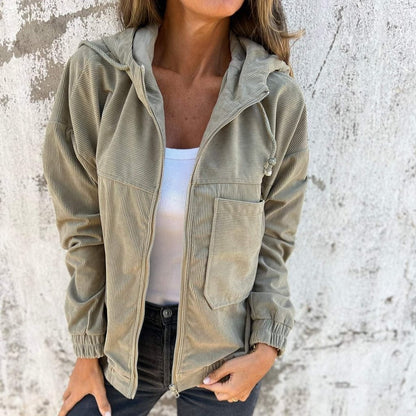 Veste unie en velours zippée à capuche .