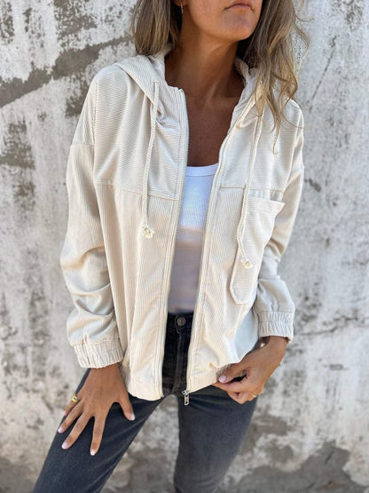 Veste unie en velours zippée à capuche .